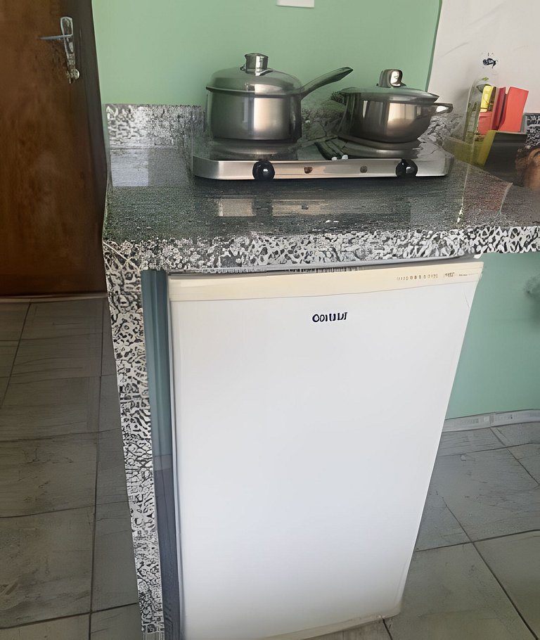 Suite equipada com cozinha , conforto e paz !