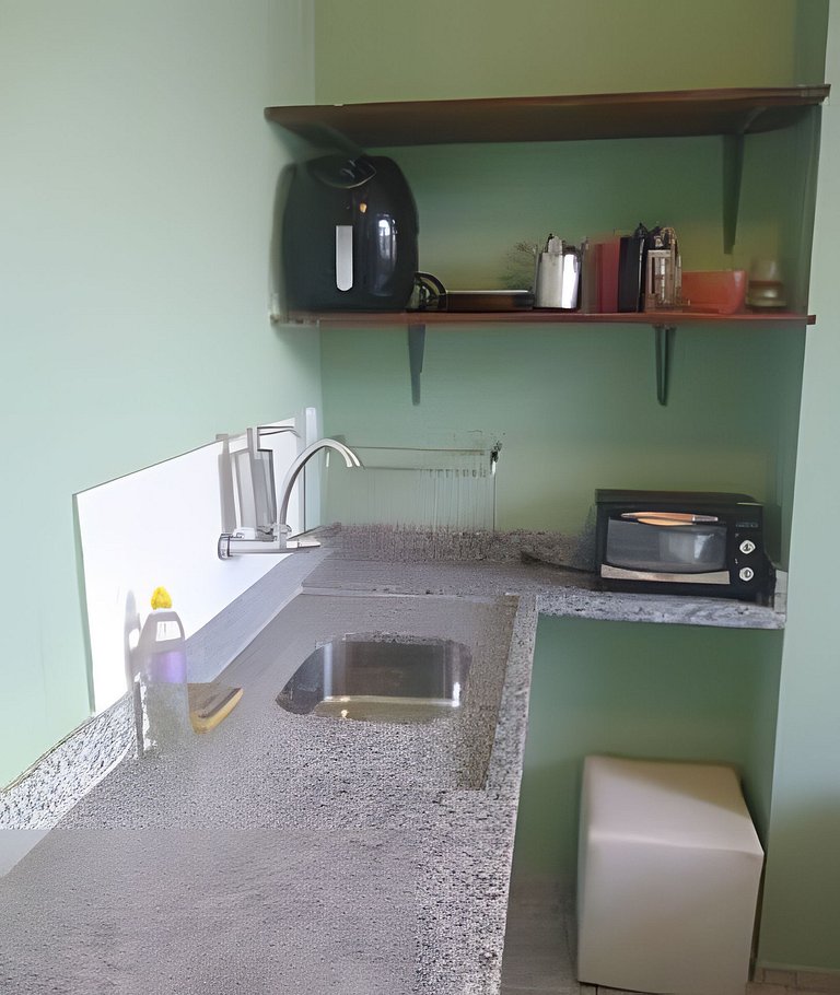 Suite equipada com cozinha , conforto e paz !
